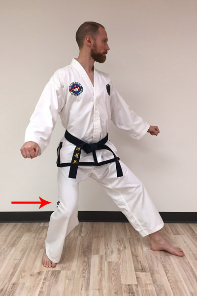 L-stance mistake: knee collapsing inward.