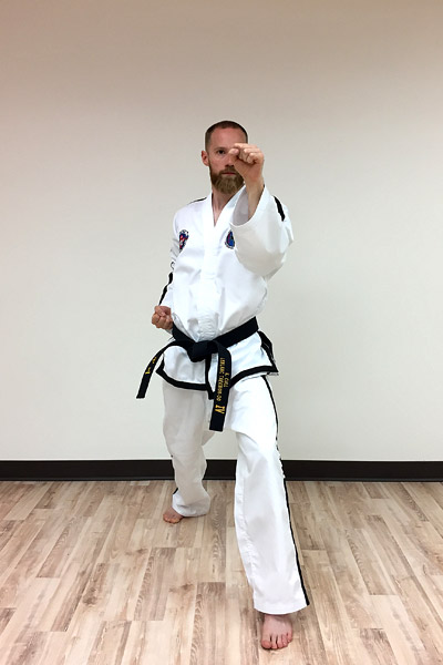 Taekwon-do outer forearm high side block (front view)